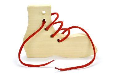Wooden toys for the development of motor movements in children against white background clipart