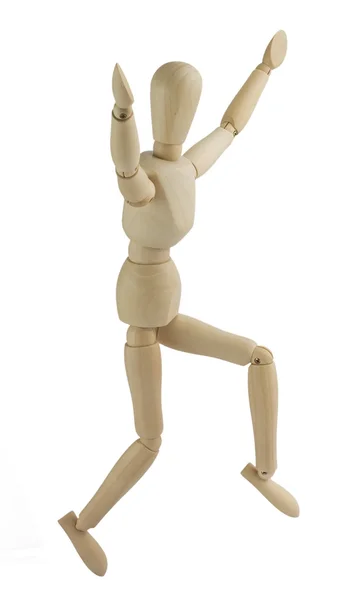 Wooden mannequin jumps — Stock Photo, Image