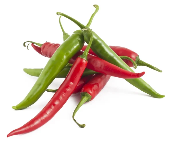 Många röd och grön chilipeppar — Stockfoto