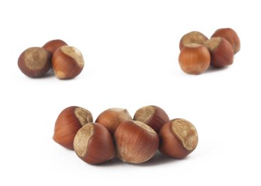 Three groups of haselnuts clipart