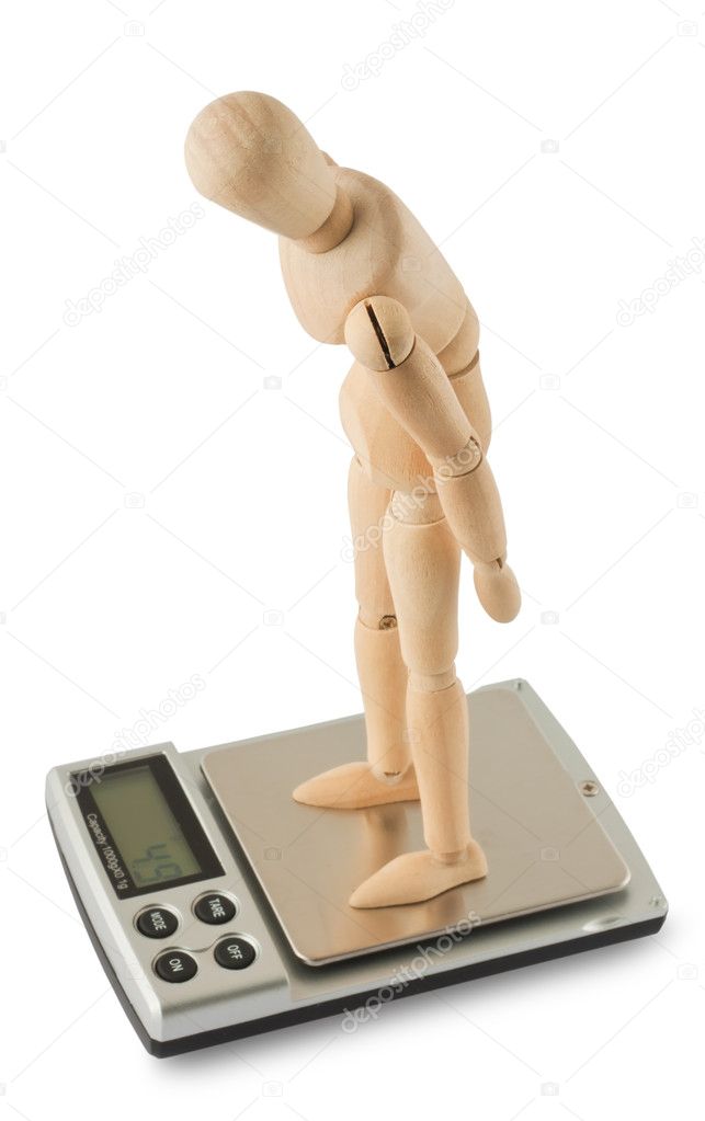 Mannequin standing on the digital scale