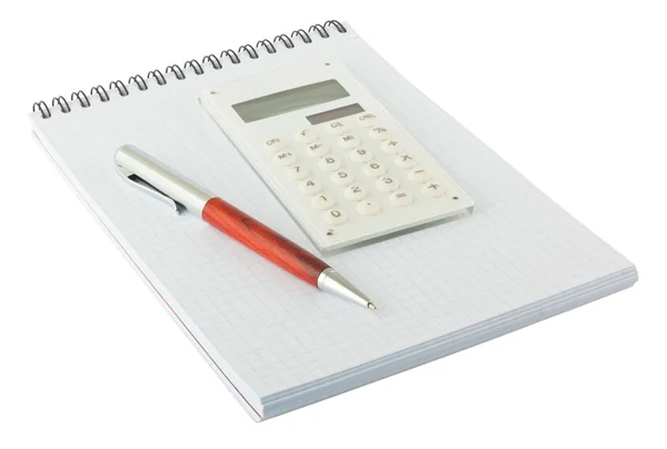 Pera a bílý Poznámkový blok kalkulačka — Stock fotografie