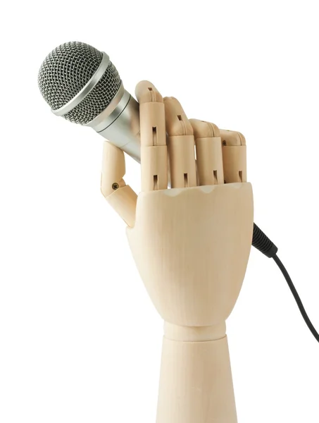 Hölzerne Hand Hält Ein Mikrofon Auf Weißem Hintergrund — Stockfoto