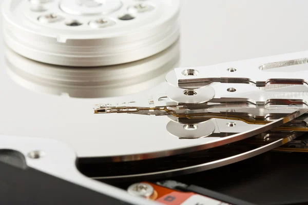 Platters and head of a computer hard drive — Stock Photo, Image