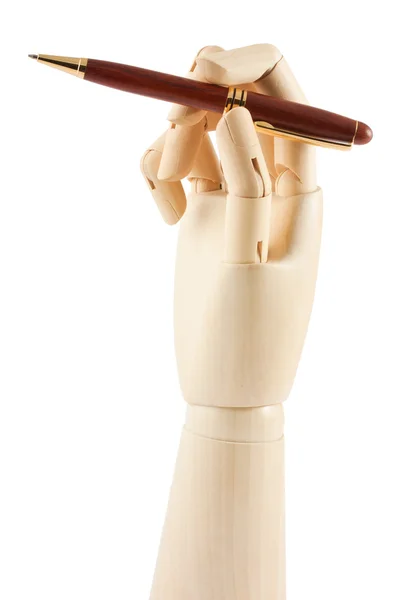 Mão e caneta de madeira — Fotografia de Stock