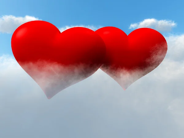 Два сердца в небе на облаках — стоковое фото