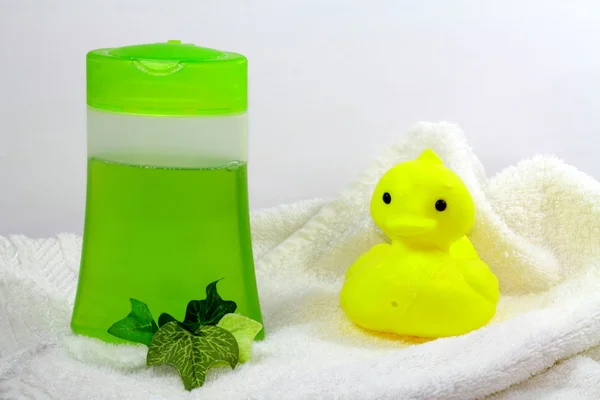 Shampoo and a baby toy — Stock Photo, Image