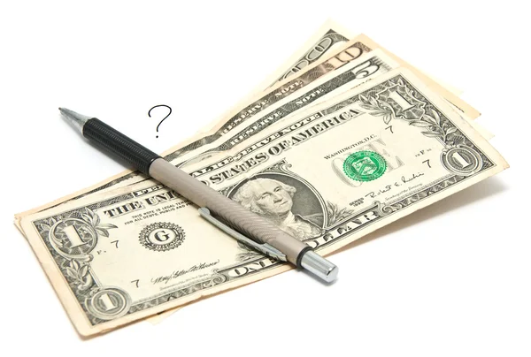 Bir sürü para, bir kalem ve bir soru işareti — Stok fotoğraf