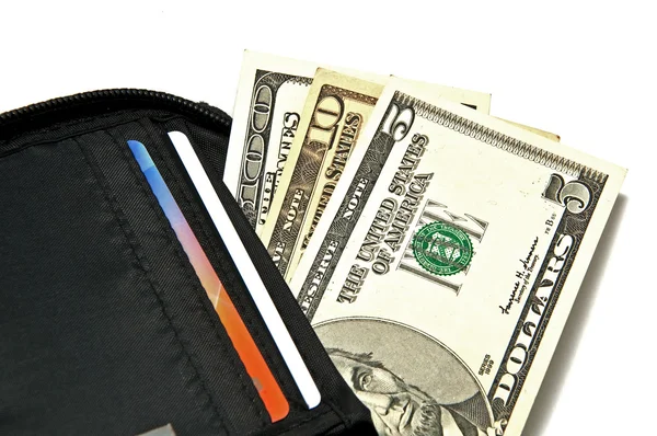 Varios billetes de dólar en el bolso — Foto de Stock