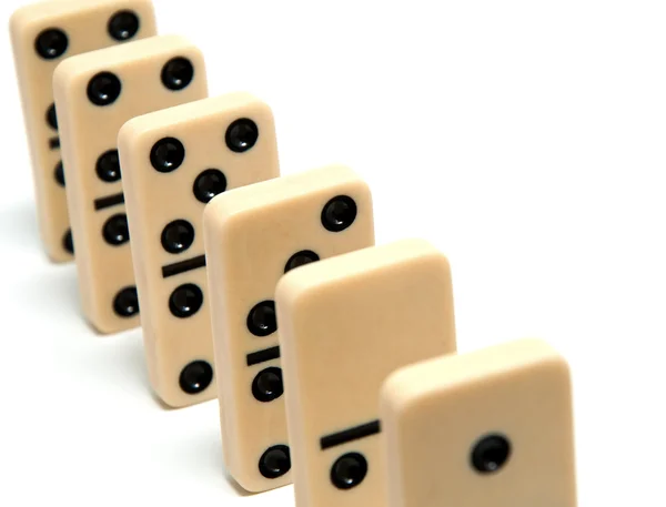 stock image Chain of dominoes on a white background