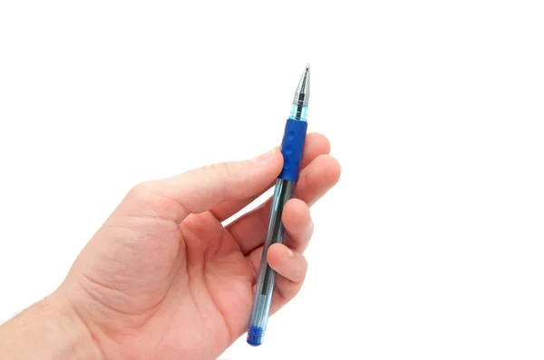 Mão segura uma caneta azul — Fotografia de Stock