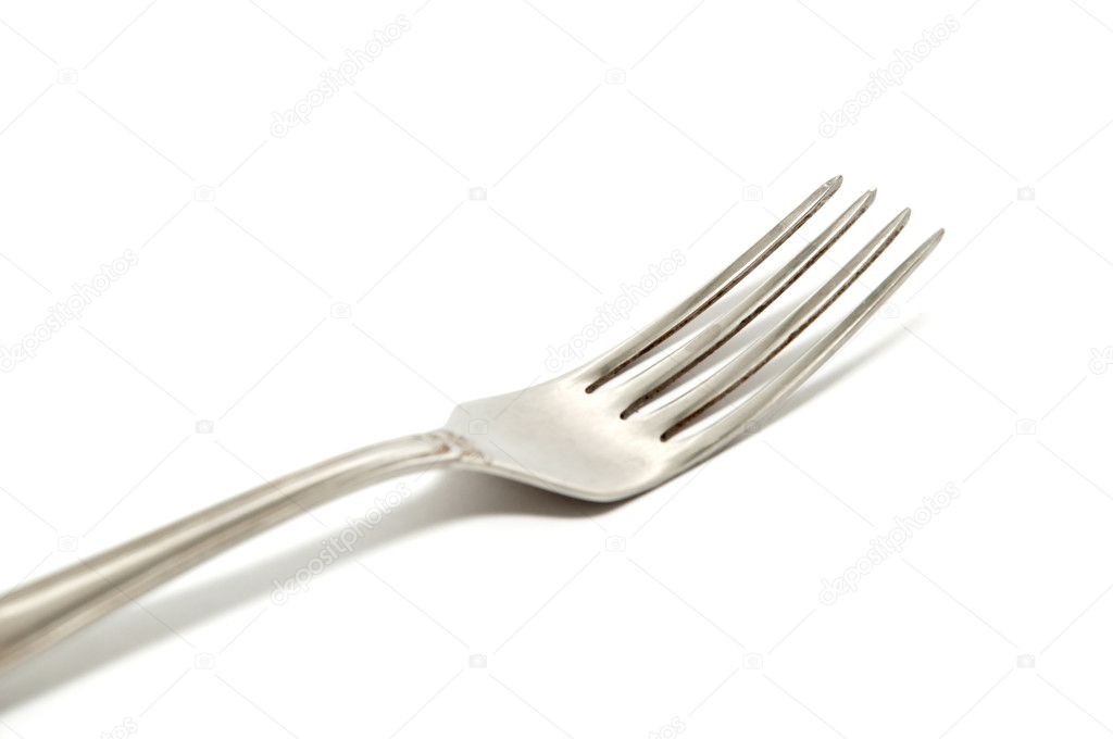 Glitter fork on a white background close up