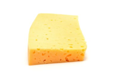 A big piece of of cheese on a white background