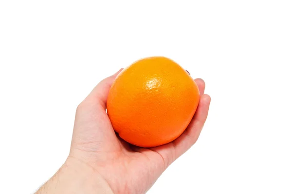 La mano sostiene una gran naranja — Foto de Stock