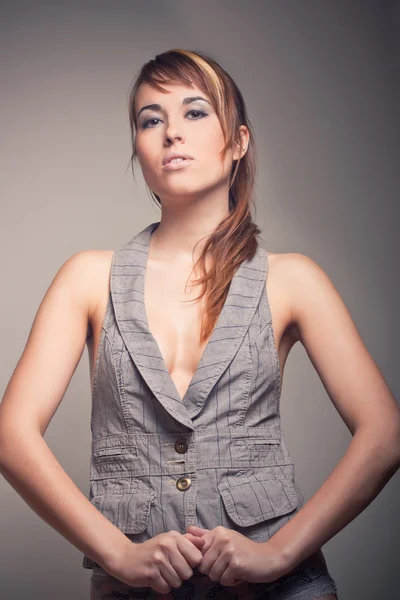 Attractive brunette girl in vest — Stock Photo, Image