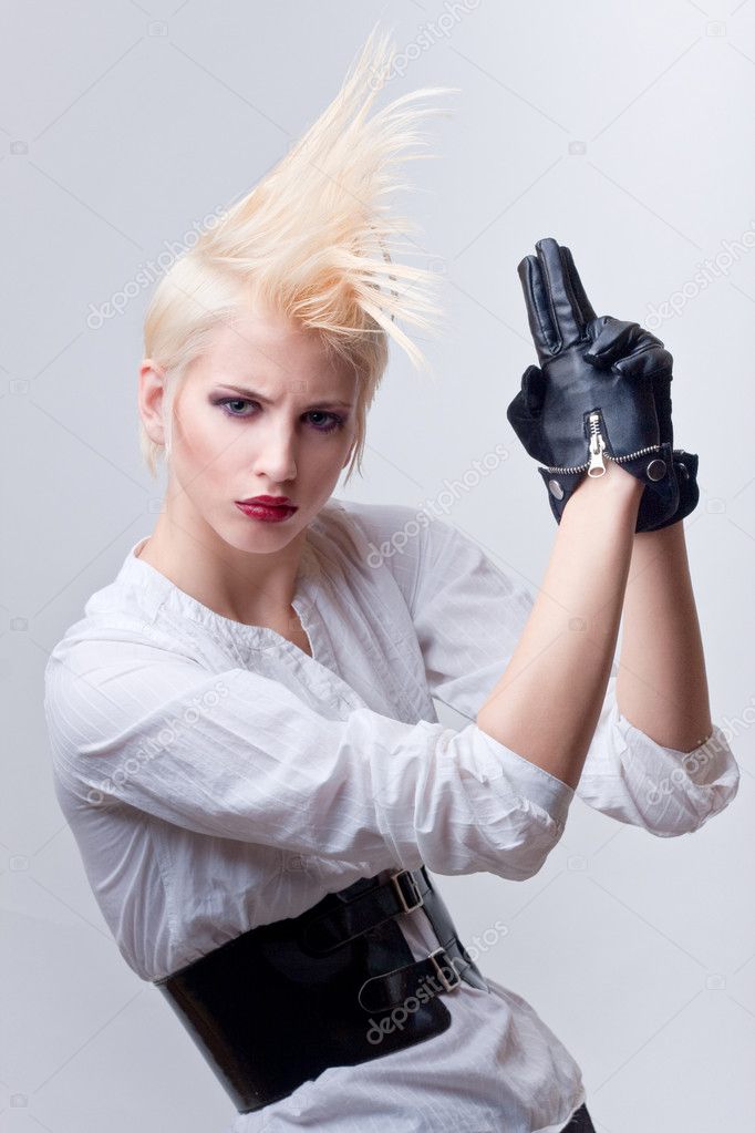 Attractive blond girl with gun