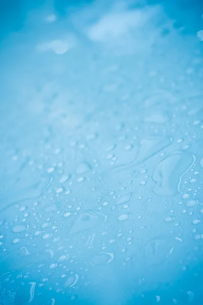 stock image Water drops on color background