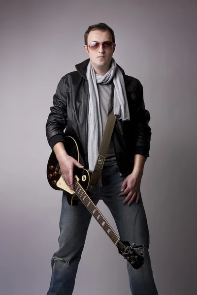 stock image Man fashion model with guitar