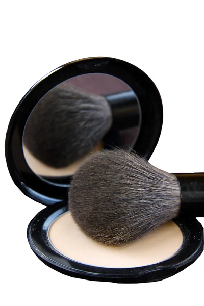Makeup brush and a box of powder — Stok fotoğraf