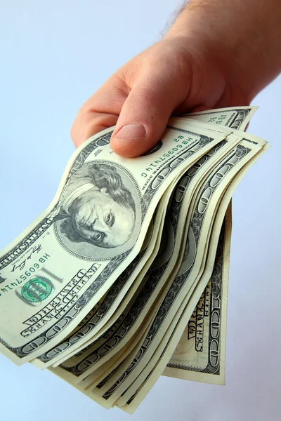 Mans hand with the US dollar — Stock Photo, Image