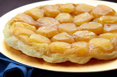 Beautiful delicious apple pie on a gold plate