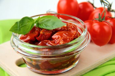 Italian sun dried tomatoes in olive oil clipart