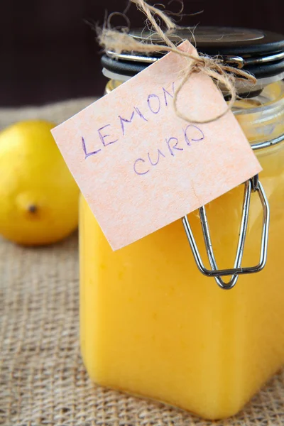 Glass jar with lemon cream curd — Stock Photo, Image