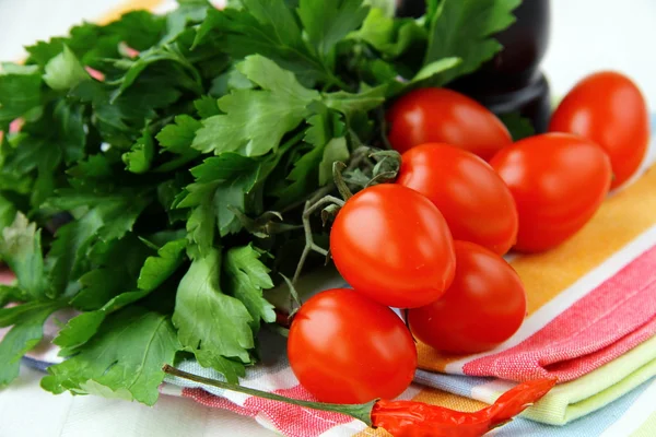 Cherry tomatoes and parsley and black pepper — Stock Photo, Image