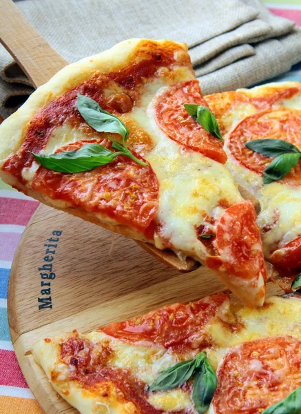 stock image Margarita pizza with tomatoes and basil cheese