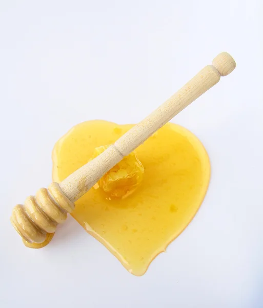 Медовий дріб з дерев'яного медопровідника — стокове фото