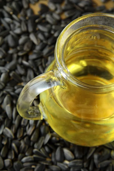 stock image Vegetable oil from sunflower seeds in a jar