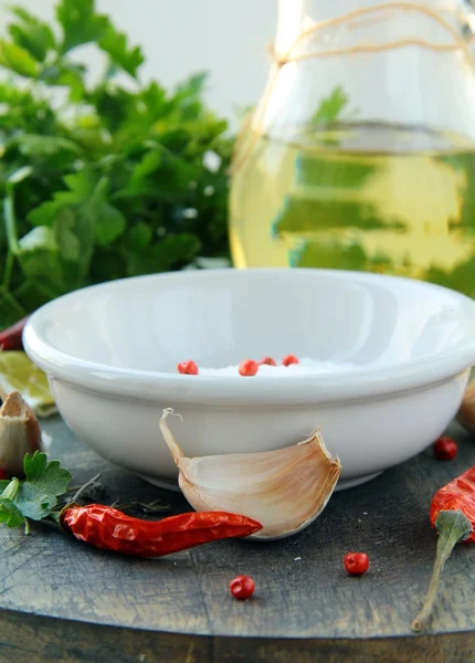 Salt, garlic, chili pepper and olive oil — Stock Photo, Image