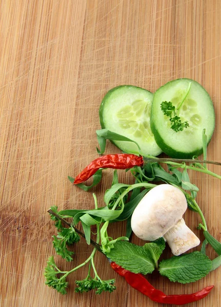 Garlic,mushrooms, chili pepper, parsley, cucumber and spices — Stock Photo, Image