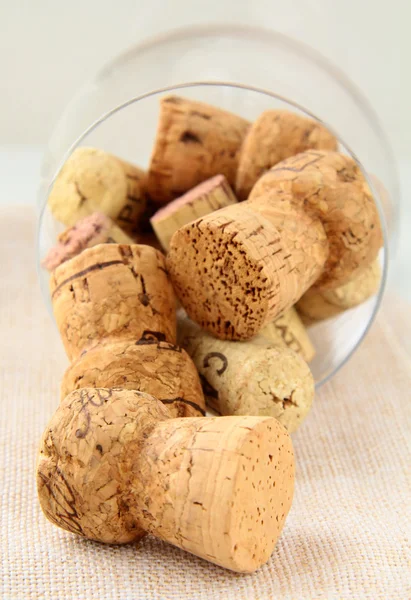 Cork from bottles of wine in the glass — Stock Photo, Image