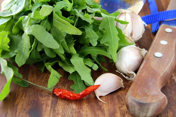 stock image Bunch of fresh arugula with garlic and pepper