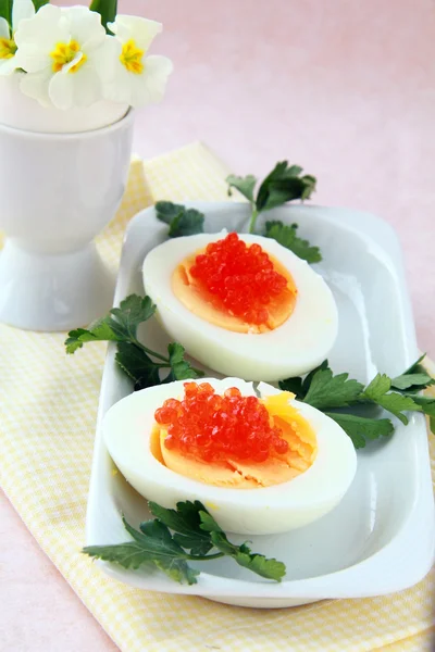 Appetizer egg with red caviar — Stock Photo, Image