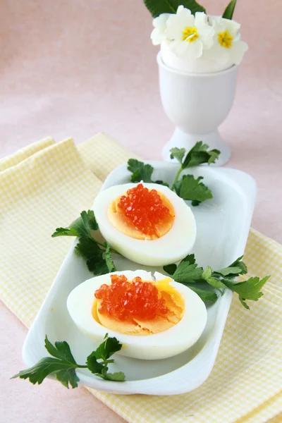 stock image Appetizer egg with red caviar