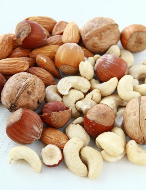 Mix nuts, hazelnuts, almonds, cashews and walnuts clipart