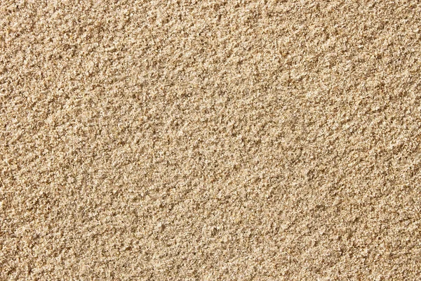 Oberfläche mit kleinem gelben Sand — Stockfoto
