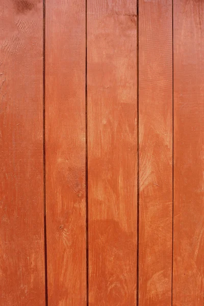 Parallelle houten planken, geschilderd in rood — Stockfoto
