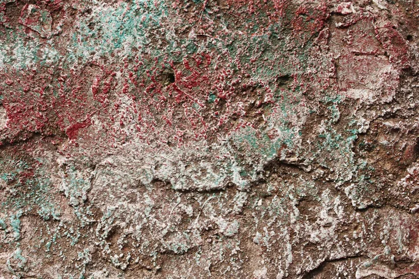 Concrete partially covered with colored paints — Stock Photo, Image