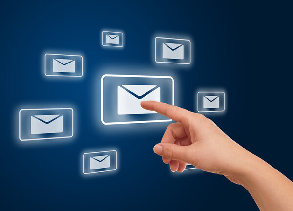 Hand pressing e-mail icon