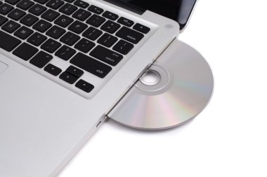 Closeup image from a laptop and a CDRom clipart