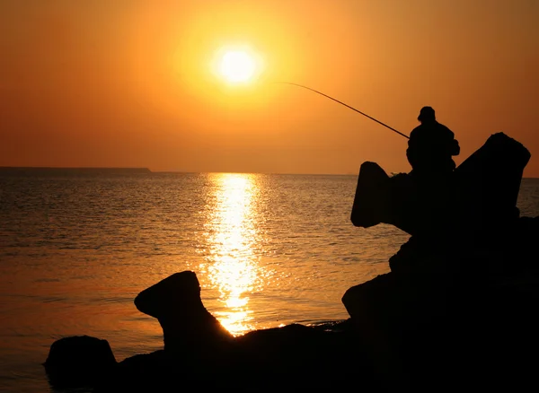 Çubuk ile balıkçı — Stok fotoğraf