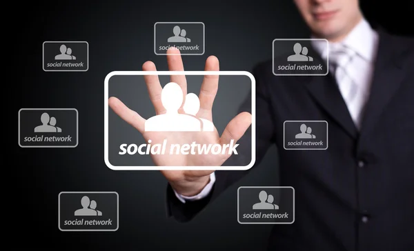 Man hand pressing Social network sign — Stock Photo, Image