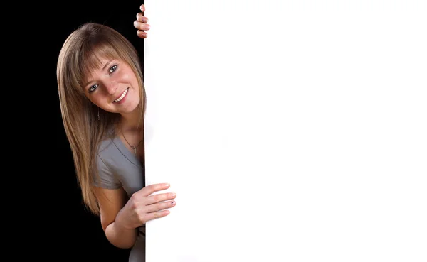 Blondýnka s prázdnou prezentaci deska — Stock fotografie