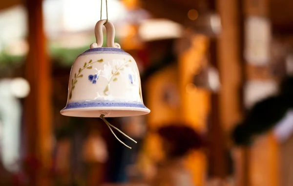 stock image Christmas bell against defocused background