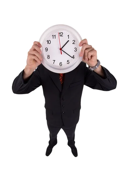 Man houdt een klok — Stockfoto