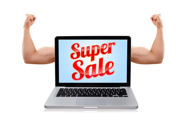 Přenosný počítač s super prodej znamení a svalnaté biceps — Stock fotografie