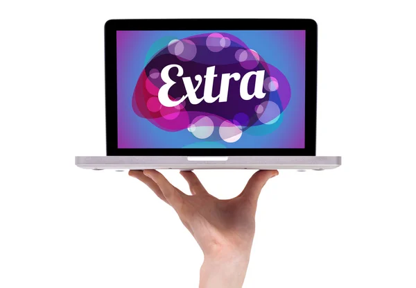 A male hand holding a laptop with extra sign — Stock Photo, Image